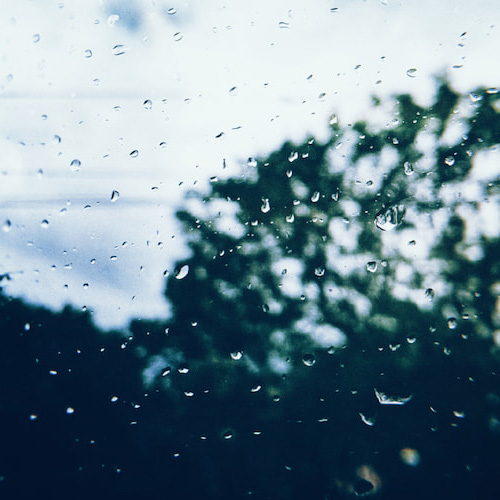 A photograph of rain on a window